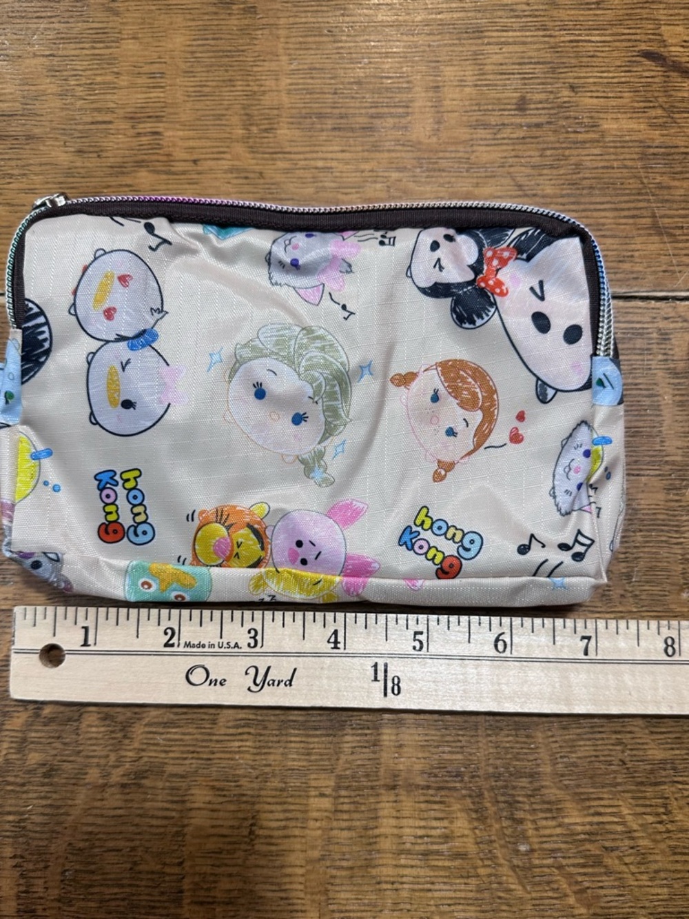 Disney  Wristlet Pouch in Ivory with Multicolor Print new‎ without tags